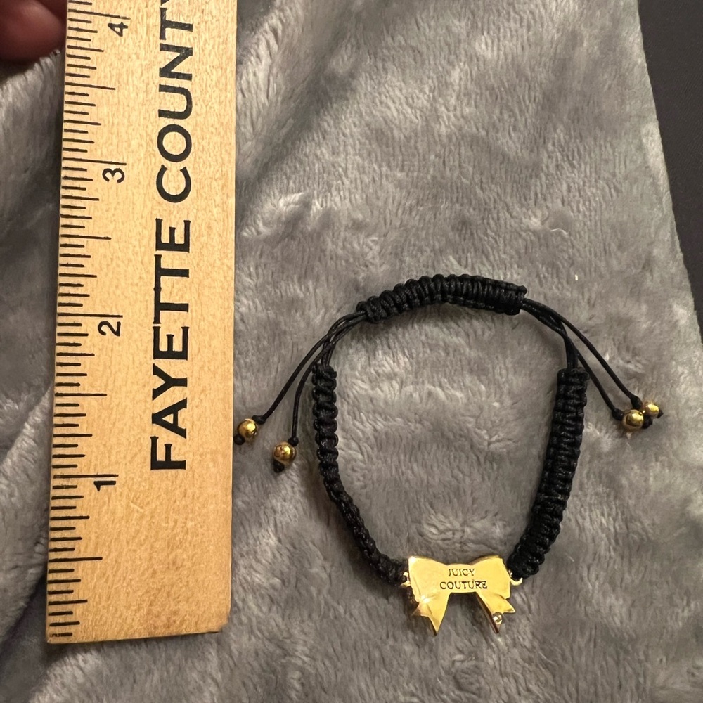 Juicy Couture Bolo Black Cord\Rhinestone Bow\Gold Tone Bead Bracelet, excellent - Picture 5 of 5